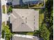 Aerial view of the roof and surrounding landscaping at 4089 Windcrest Dr, Wesley Chapel, FL 33544