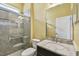 Bathroom with tiled shower, vanity, and granite countertop at 4089 Windcrest Dr, Wesley Chapel, FL 33544