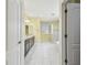 Bright bathroom featuring double vanity with dark cabinets, granite countertops, and walk-in shower at 4089 Windcrest Dr, Wesley Chapel, FL 33544