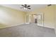 Bedroom featuring French doors to a landing and neutral carpet at 4089 Windcrest Dr, Wesley Chapel, FL 33544