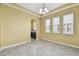 Dining area featuring natural light from windows and seamless access to the kitchen and living space at 4089 Windcrest Dr, Wesley Chapel, FL 33544