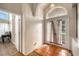 Welcoming entryway with tile flooring and a decorative arched window over the front door at 4303 Kipling Ave, Plant City, FL 33566
