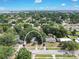An aerial view of the property highlighting its location, landscaping, and proximity to local amenities at 4425 W Bay Ave, Tampa, FL 33616