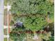 An aerial view of the property boundaries, showcasing the landscaping and the location within the neighborhood at 4425 W Bay Ave, Tampa, FL 33616