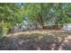 The residence features a spacious backyard with plenty of room for outdoor activities at 4425 W Bay Ave, Tampa, FL 33616
