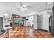Bonus room featuring checkered tile, direct access to the laundry area and extra storage at 4425 W Bay Ave, Tampa, FL 33616