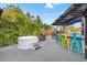 The relaxing outdoor space features a hot tub, bar area, and mature landscaping for ultimate relaxation and privacy at 4570 67Th N St, St Petersburg, FL 33709
