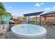 The backyard features a hot tub and full outdoor bar area, great for entertaining or relaxing at home at 4570 67Th N St, St Petersburg, FL 33709