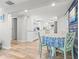 Charming dining area leads to a bright, well-equipped kitchen with modern appliances and countertops at 4570 67Th N St, St Petersburg, FL 33709