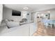 Open-concept living room and dining area with modern furnishings, perfect for entertaining and relaxing at 4570 67Th N St, St Petersburg, FL 33709