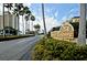 Sea Towers community entrance with well-maintained landscaping at 4750 Cove Cir # 1001, St Petersburg, FL 33708