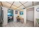 Adjacent to the kitchen is a small dining area, adjacent to the living room, and a storage closet at 4750 Cove Cir # 1001, St Petersburg, FL 33708