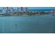 Panoramic waterfront view showcasing tranquil waters and cityscapes in the distance at 4750 Cove Cir # 1001, St Petersburg, FL 33708