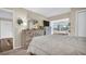 Relaxing bedroom with balcony access and stylish furniture, perfect for enjoying quiet moments and serene views at 4812 Jasper Dr # 203, New Port Richey, FL 34652