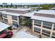Exterior aerial view showcases the community building's walkway to the units at 4812 Jasper Dr # 203, New Port Richey, FL 34652