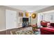 Bright living area with stylish decor, a TV, and comfortable seating at 4812 Jasper Dr # 203, New Port Richey, FL 34652