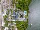 Overhead aerial view of a condo building near the bay offering waterfront living with great amenities at 500 N Osceola Ave # 811, Clearwater, FL 33755