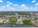 Panoramic aerial view showcases a coastal city, with the high-rise condo offering exceptional views of the surrounding landscape at 500 N Osceola Ave # 811, Clearwater, FL 33755