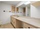 Bathroom featuring a large mirror, long vanity, and great natural light at 500 N Osceola Ave # 811, Clearwater, FL 33755
