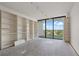 Bedroom with shelving and great views through balcony doors ready for upgrades at 500 N Osceola Ave # 811, Clearwater, FL 33755