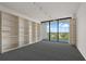 Bedroom with lots of shelving and great views through balcony doors at 500 N Osceola Ave # 811, Clearwater, FL 33755