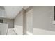 Hallway featuring the condo unit entrance with a patterned door at 500 N Osceola Ave # 811, Clearwater, FL 33755