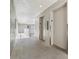 Hallway with elevator access in a neutral color palette with plenty of natural light at 500 N Osceola Ave # 811, Clearwater, FL 33755