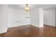 Living room features hardwood floors and a classic chandelier, ready for personalization at 500 N Osceola Ave # 811, Clearwater, FL 33755