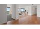 Spacious living room with sleek flooring, large windows, and sliding glass doors to balcony at 500 N Osceola Ave # 811, Clearwater, FL 33755