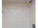 Shower featuring a tiled wall and shower head at 500 N Osceola Ave # 811, Clearwater, FL 33755