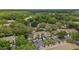 Scenic aerial view of a well-maintained condo building with lush landscaping and ample parking at 5100 Burchette Rd # 2702, Tampa, FL 33647