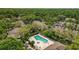 Overhead view of a community pool with hot tub, sun loungers, and a nearby cabana at 5100 Burchette Rd # 2702, Tampa, FL 33647