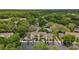 Aerial view of community, highlighting landscaping, parking, and a resort-style pool at 5100 Burchette Rd # 2702, Tampa, FL 33647