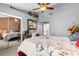 This is a spacious bedroom featuring mirrored closets and adjoined bedroom, providing an expanded living area at 5100 Burchette Rd # 2702, Tampa, FL 33647