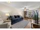 Inviting living area showing comfortable seating, view of dining, and stylish decor at 5100 Burchette Rd # 2702, Tampa, FL 33647