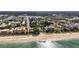 Scenic aerial view of the coastline with beaches, condos, and waterways at 512 1St St # 108, Indian Rocks Beach, FL 33785