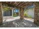 Stone patio with a vine-covered pergola offers shade and charm in the backyard at 526 36Th Ne Ave, St Petersburg, FL 33704