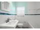 Bathroom with updated fixtures, vanity, and stylish white subway tile at 526 36Th Ne Ave, St Petersburg, FL 33704