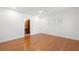 Bright bedroom featuring hardwood floors, natural light, closet, and neutral paint at 526 36Th Ne Ave, St Petersburg, FL 33704