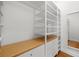 Walk-in closet with adjustable shelving, drawers, and space for organized storage at 526 36Th Ne Ave, St Petersburg, FL 33704