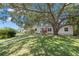 Charming single-story home with a lush green lawn and mature shade tree in a desirable neighborhood at 526 36Th Ne Ave, St Petersburg, FL 33704