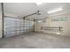 An empty garage interior with windows and a ladder at 526 36Th Ne Ave, St Petersburg, FL 33704