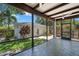 Screened-in porch provides a lovely view of the landscaped backyard and guest house at 526 36Th Ne Ave, St Petersburg, FL 33704