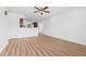 Bright living room featuring new wood floors and white walls providing a clean and modern space at 5326 22Nd N Ave, St Petersburg, FL 33710