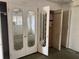 Bedroom including mirrored closet doors and a ceiling fan at 5600 9Th N Ave, St Petersburg, FL 33710