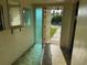 Inviting foyer with tile flooring, leading to other areas of the house at 5600 9Th N Ave, St Petersburg, FL 33710
