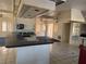 Kitchen boasting tiled flooring, a functional breakfast bar, and access to living areas at 5600 9Th N Ave, St Petersburg, FL 33710