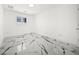 Bedroom featuring marble floors, and a bright atmosphere at 600 115Th Ave, Treasure Island, FL 33706