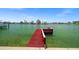 Dock featuring bench and water view at 600 115Th Ave, Treasure Island, FL 33706