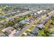 Real estate aerial view of a waterfront neighborhood with mature trees and beautiful landscaping at 629 Fort Duquesna Dr, Sun City Center, FL 33573